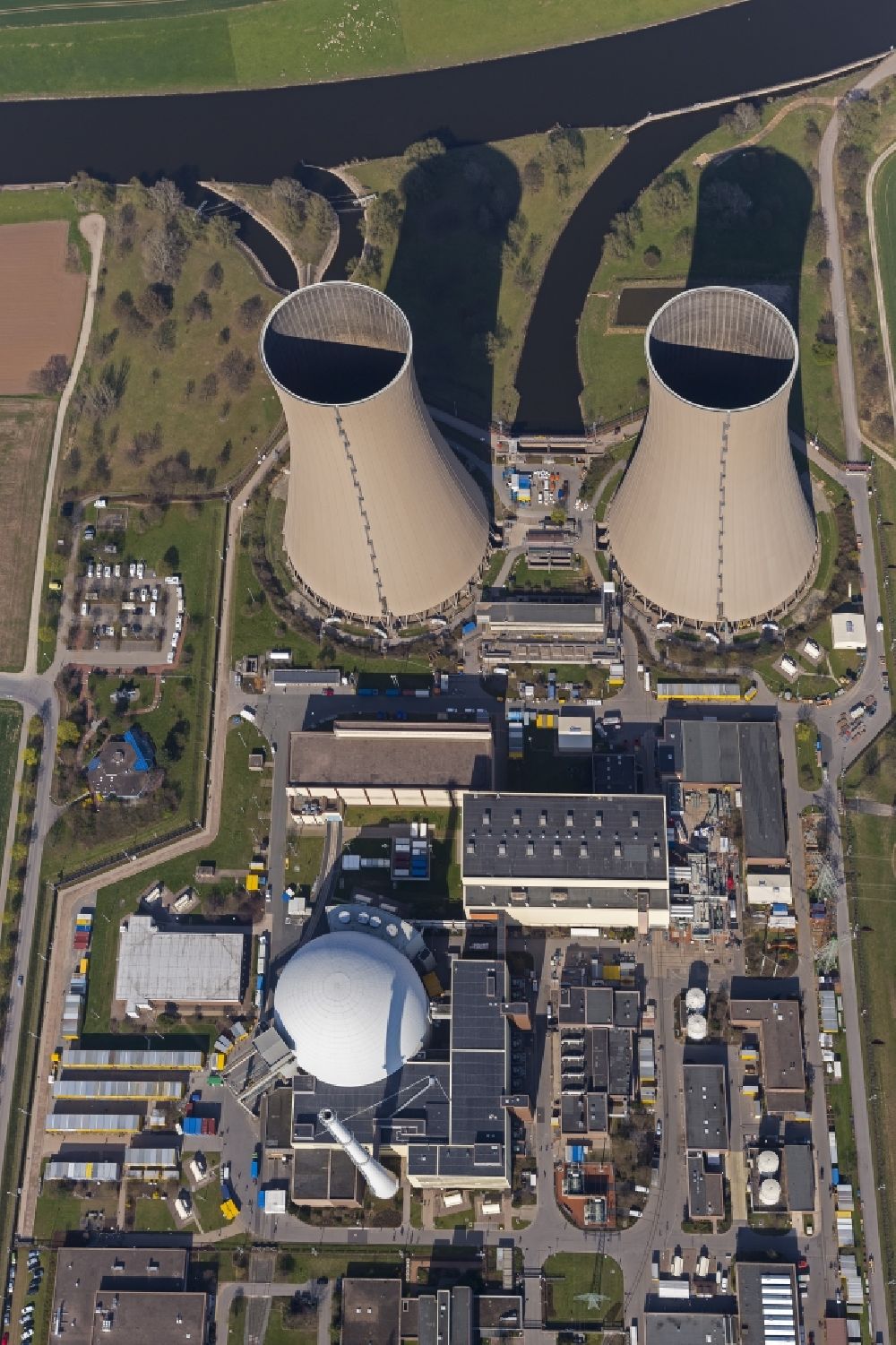 Aerial image Grohnde - View onto the cooling tower of the Nuclear Power Plant in Grohnde in the state Lower Saxony. It is located north of Grohnde at the river Weser
