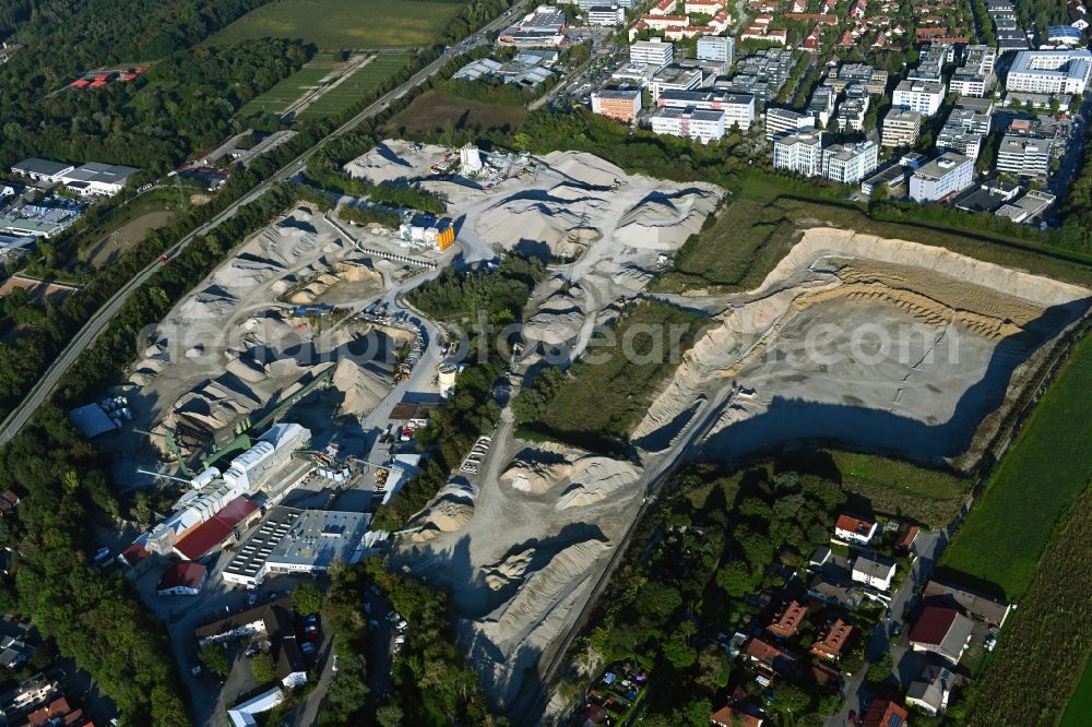 Gräfelfing from the bird's eye view: Site and tailings area of the gravel mining of Bernhard Glueck Kies-Sand-Hartsteinsplitt GmbH in the district Lochham in Graefelfing in the state Bavaria, Germany