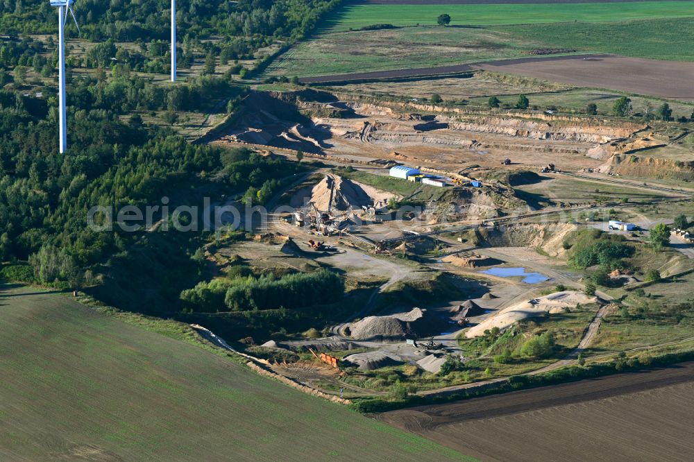 Kraatz from the bird's eye view: Site and tailings area of the gravel mining CEMEX Kies & Splitt GmbH in Kraatz in the state Brandenburg, Germany