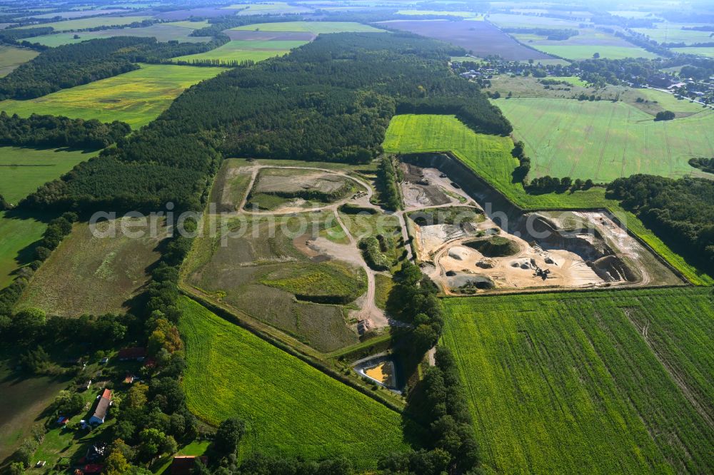 Aerial photograph Dersenow - Site and tailings area of the gravel mining on street Am Sonnenberg in Dersenow in the state Mecklenburg - Western Pomerania, Germany