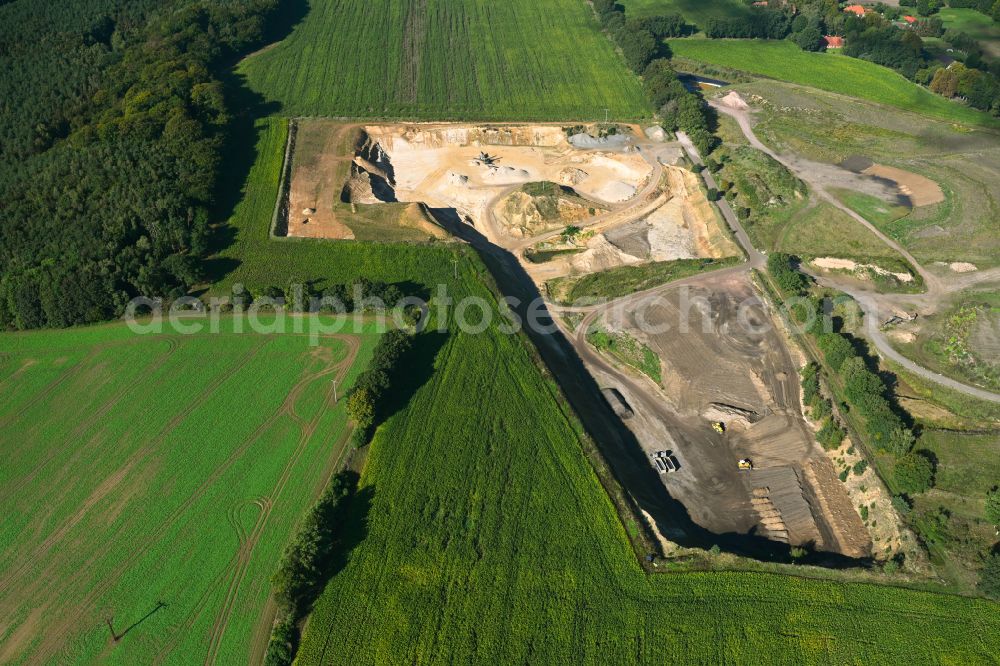 Aerial image Dersenow - Site and tailings area of the gravel mining on street Am Sonnenberg in Dersenow in the state Mecklenburg - Western Pomerania, Germany