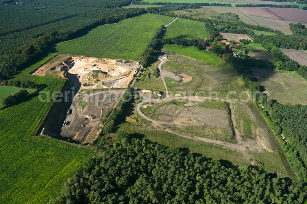 Aerial photograph Dersenow - Site and tailings area of the gravel mining on street Am Sonnenberg in Dersenow in the state Mecklenburg - Western Pomerania, Germany