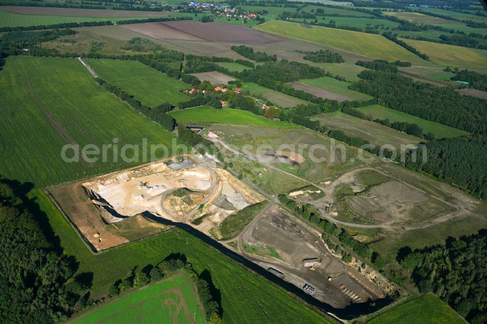 Dersenow from above - Site and tailings area of the gravel mining on street Am Sonnenberg in Dersenow in the state Mecklenburg - Western Pomerania, Germany