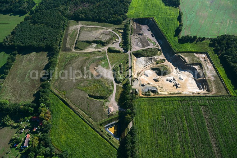 Dersenow from above - Site and tailings area of the gravel mining on street Am Sonnenberg in Dersenow in the state Mecklenburg - Western Pomerania, Germany