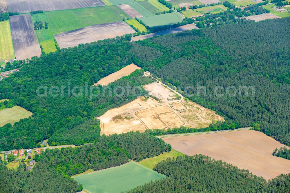 Rullstorf from above - Site and tailings area of the gravel mining of Kieswerk Menneke Karls GmbH in Rullstorf in the state Lower Saxony, Germany