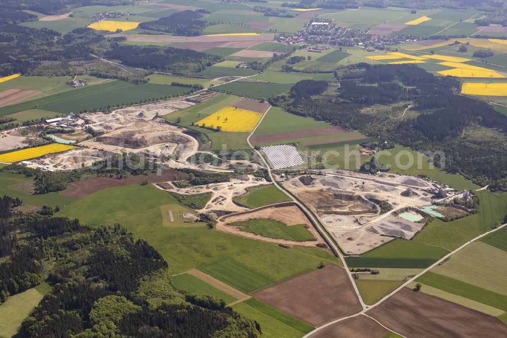 Gauting from the bird's eye view: Site and tailings area of the gravel mining Kieswerk Unterbrunn Balthasar Trinkl KG in Gauting in the state Bavaria, Germany