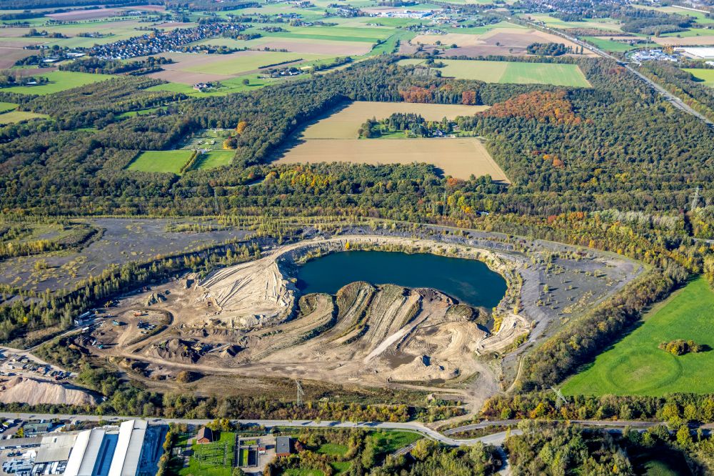 Kamp-Lintfort from the bird's eye view: Site and tailings area of the gravel mining of Koelbl GmbH & Co. KG in Kamp-Lintfort at Ruhrgebiet in the state North Rhine-Westphalia, Germany