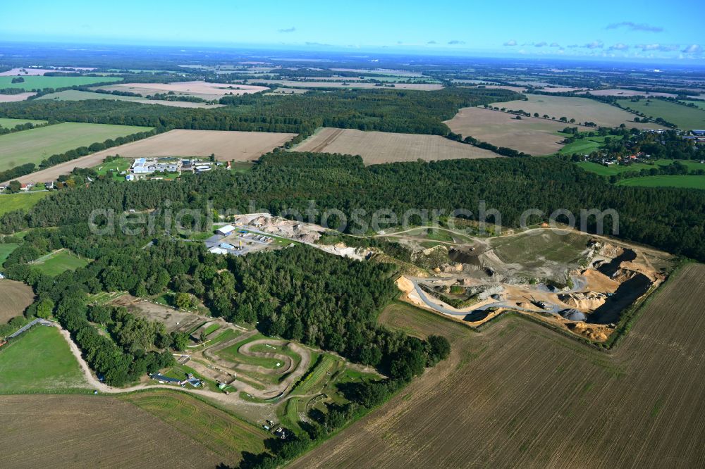 Aerial photograph Vellahn - Site and tailings area of the gravel mining in Vellahn in the state Mecklenburg - Western Pomerania, Germany