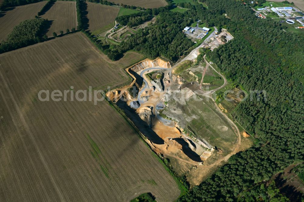 Vellahn from the bird's eye view: Site and tailings area of the gravel mining in Vellahn in the state Mecklenburg - Western Pomerania, Germany