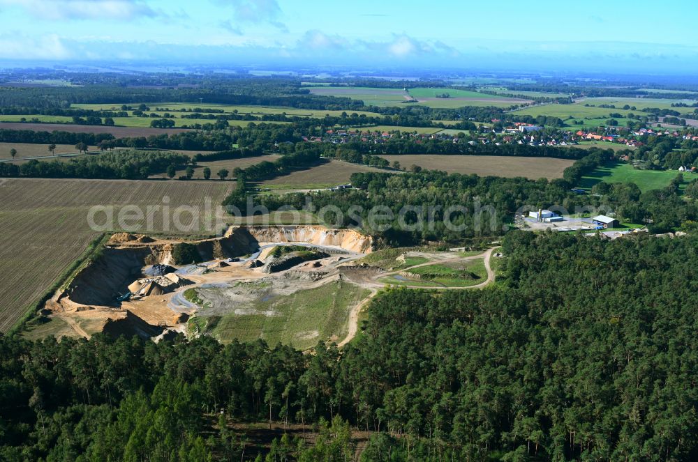 Vellahn from the bird's eye view: Site and tailings area of the gravel mining in Vellahn in the state Mecklenburg - Western Pomerania, Germany