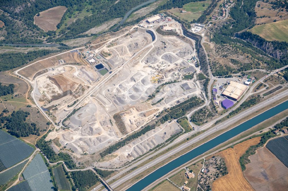 Aerial image Ventavon - Site and tailings area of the gravel mining in Ventavon in Provence-Alpes-Cote d'Azur, France