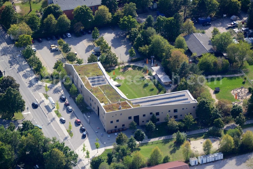 Aerial image München - Daycare facility for children Haus der Kinder in the Trudering part of Munich in the state of Bavaria. The day-care center is the largest of Munich and includes a distinct architecture and a large outdoor area with playground