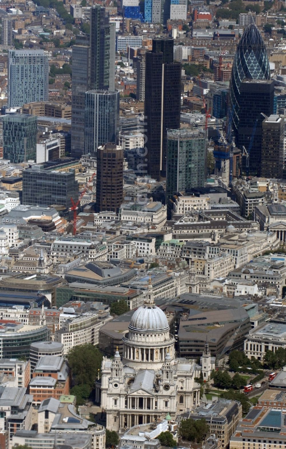 Aerial photograph London - View of the St Paul's Cathedral in the city borough of City of London. The world-famous church building is the headquarters of the London diocese of the Anglican Church. The St. Paul's Cathedral is one of the largest cathedrals in the world, it is also regarded as the most famous church in the British capital