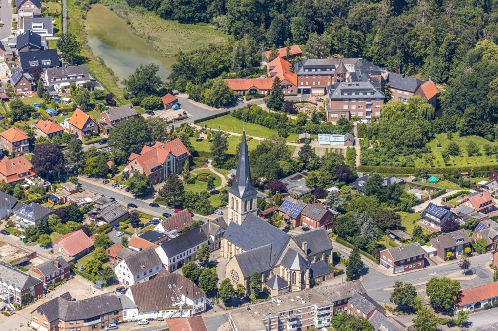 Nordwalde from above - Church building of St. Dionysius on Amtmann-Daniel-Strasse overlooking the St. Franziskus-Haus on Proebstingstrasse in Nordwalde in the state North Rhine-Westphalia, Germany