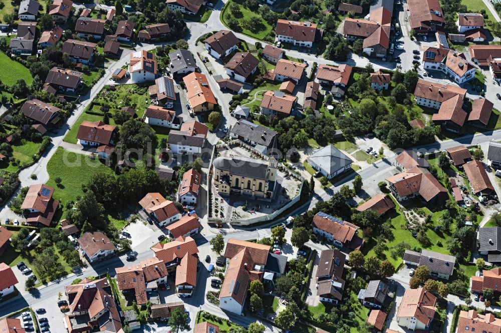 Chieming from the bird's eye view: Church building in the village of in Chieming in the state Bavaria, Germany