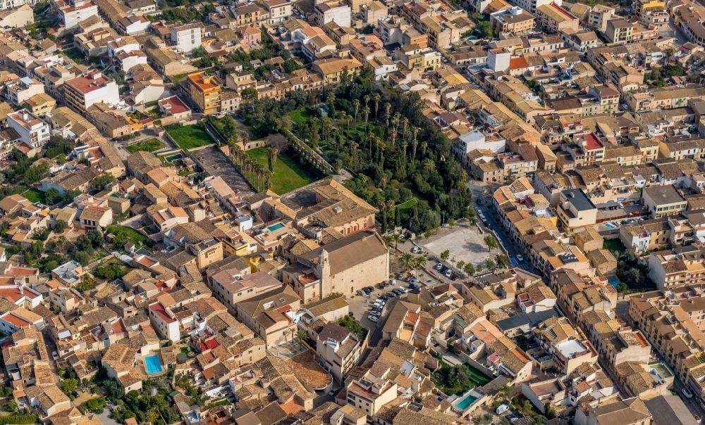 Aerial photograph Lloseta - Church building in EsglA?sia de Lloseta and Palmengarten Old Town- center of downtown in Lloseta in Balearische Insel Mallorca, Spain