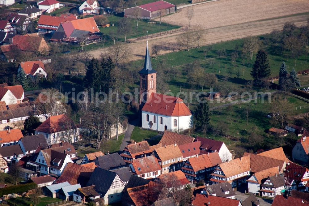 Hunspach from the bird's eye view: Protestant Church building in the village of in Hunspach in Grand Est, France