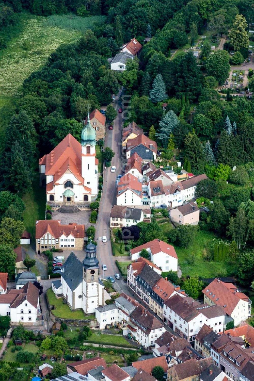 Winnweiler from the bird's eye view: Church building of catholic Church Herz Jesu in Winnweiler in the state Rhineland-Palatinate, Germany