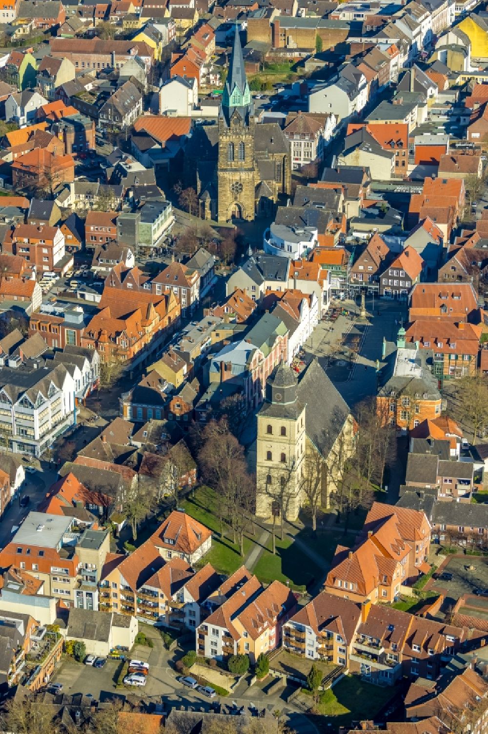 Ahlen from above - Church building of the Catholic parish of St. Bartholomew in the old city center of the city center in Ahlen in the federal state of North Rhine-Westphalia, Germany