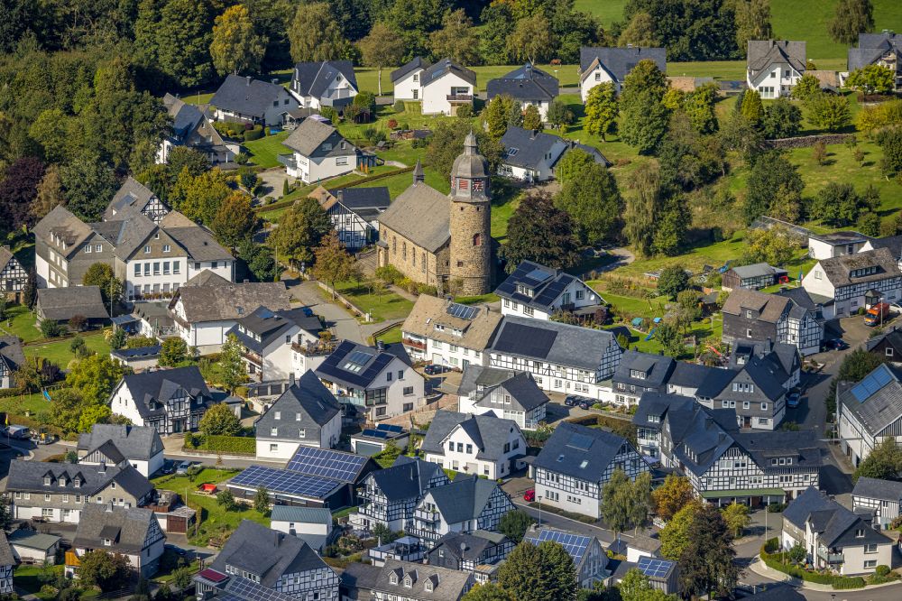 Schmallenberg from the bird's eye view: Church building St. Michael in Holthausen in the village of on street Kirchstrasse in the district Holthausen in Schmallenberg at Sauerland in the state North Rhine-Westphalia, Germany