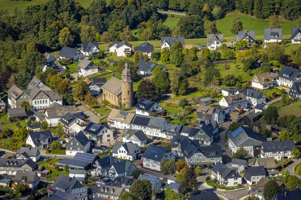 Aerial image Schmallenberg - Church building St. Michael in Holthausen in the village of on street Kirchstrasse in the district Holthausen in Schmallenberg at Sauerland in the state North Rhine-Westphalia, Germany