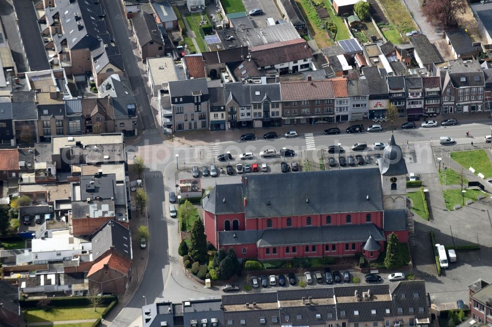 Hoeselt from the bird's eye view: Church building on Wierookstraat Old Town- center of downtown in Hoeselt in Vlaan deren, Belgium