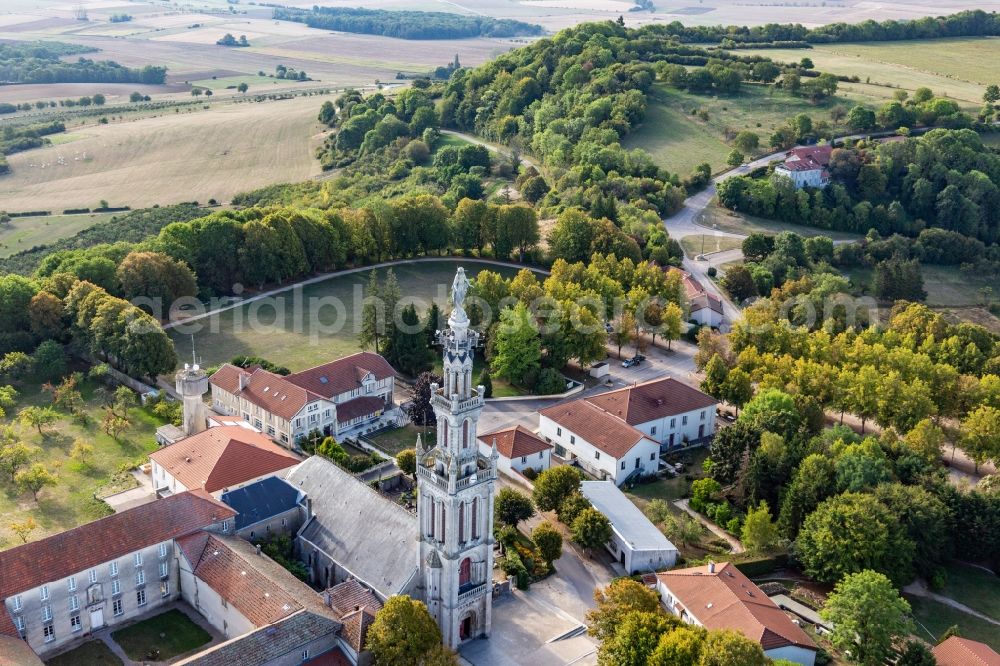 Saxon-Sion from the bird's eye view: Church tower and tower roof at the church building of Basilique Notre-Dame de Sion in Saxon-Sion in Grand Est, France