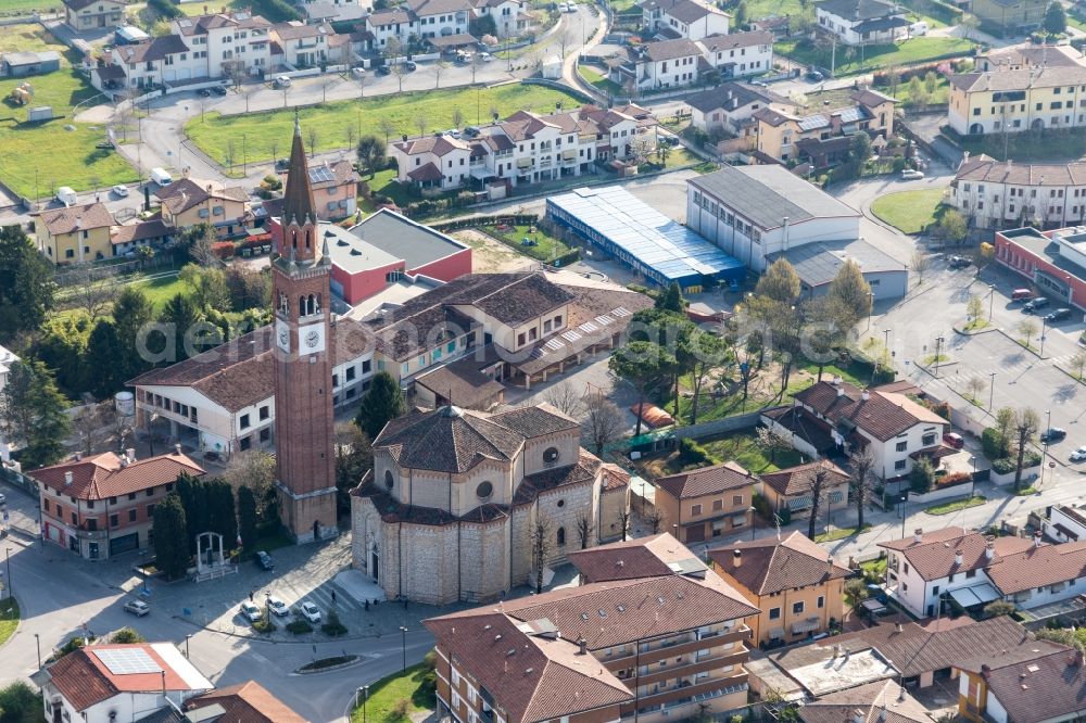Fiume Veneto from above - Church tower and tower roof at the church building of Chiesa delle Sante Perpetua e Felicita in Fiume Veneto in Friuli-Venezia Giulia, Italy
