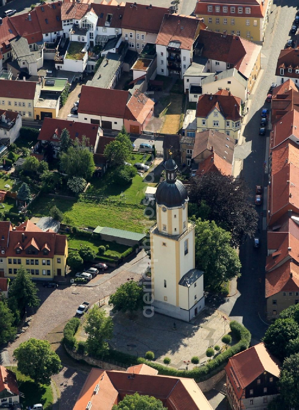 Aerial photograph Ohrdruf - On the Michaelis place in Ohrdruf in Thuringia is the tower of the former St. Machaeliskirche. The former city church was razed to the obtained tower at the end of WW2. From the tower, which have one of the landmarks of the city, the visitors a good view of the old town and the surrounding area. In the church of the famous church musician Johann Sebastian Bach had the play the organ from his brother learned