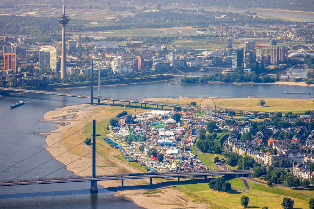 Düsseldorf from the bird's eye view: Fair - event location at festival Festwiese Oberkassel on rhine river in Duesseldorf in the state North Rhine-Westphalia, Germany