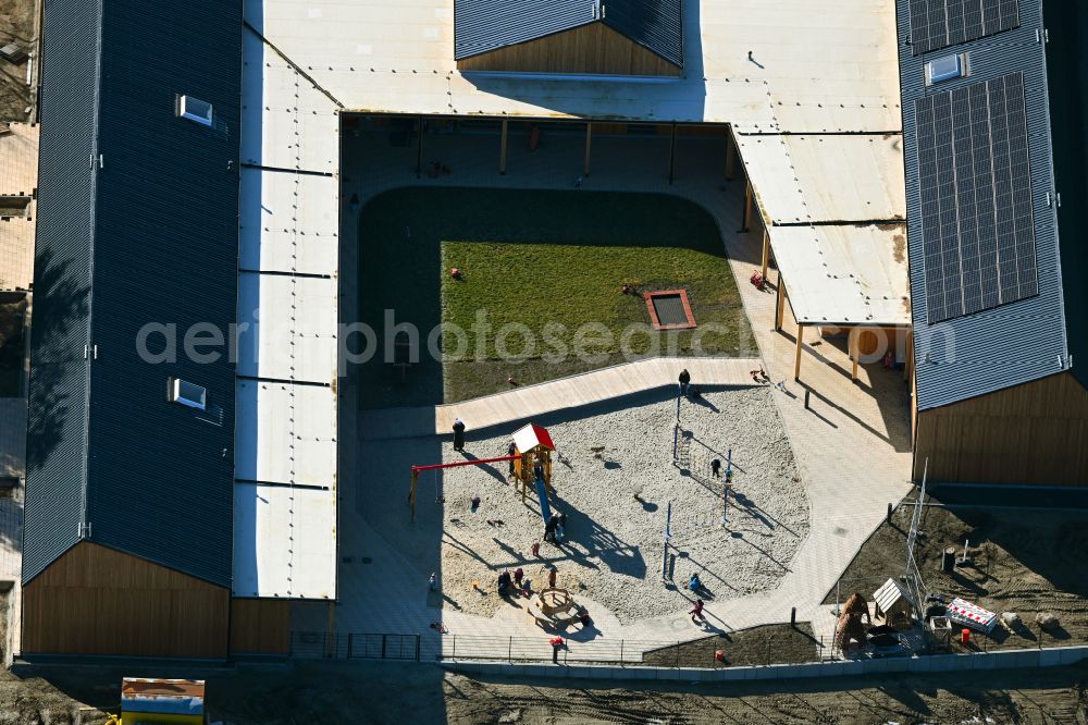 Biesenthal from the bird's eye view: New construction site for the construction of a kindergarten building and Nursery school in Biesenthal in the state Brandenburg, Germany