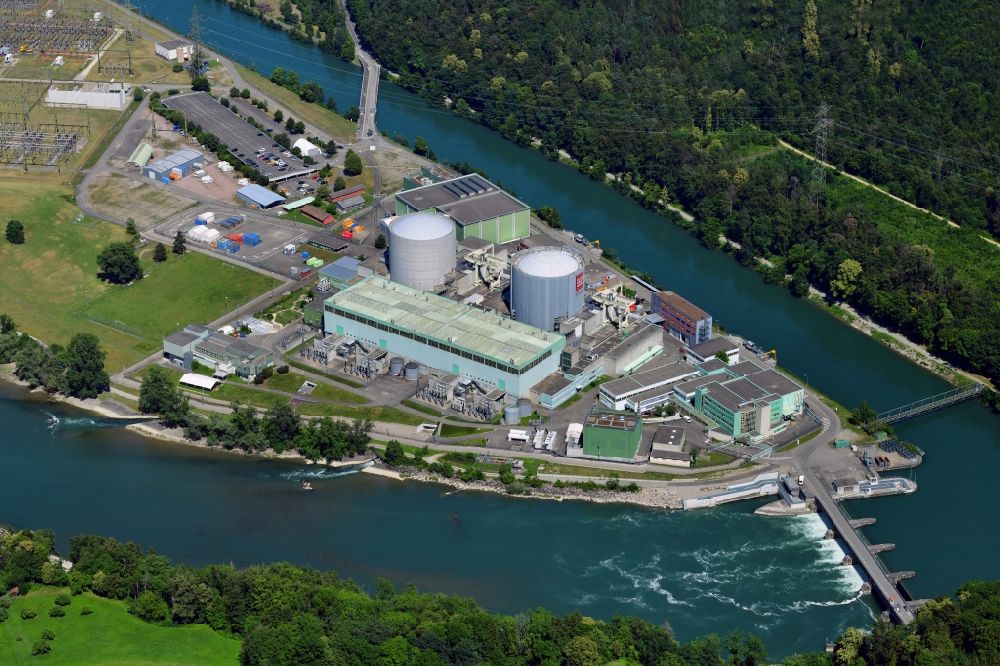 Beznau from the bird's eye view: Building remains of the reactor units and facilities of the NPP nuclear power plant on river of Aare in Beznau in the canton Aargau, Switzerland