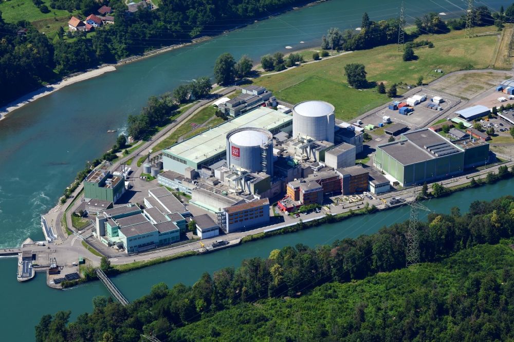 Aerial image Beznau - Building remains of the reactor units and facilities of the NPP nuclear power plant on river of Aare in Beznau in the canton Aargau, Switzerland