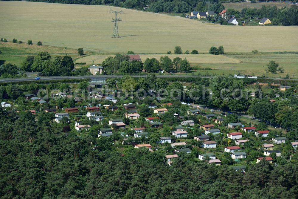 Aerial photograph Schönefeld - Allotements, high voltage current tower and fields in the Grossziethen part of Schoenefeld in the state of Brandenburg