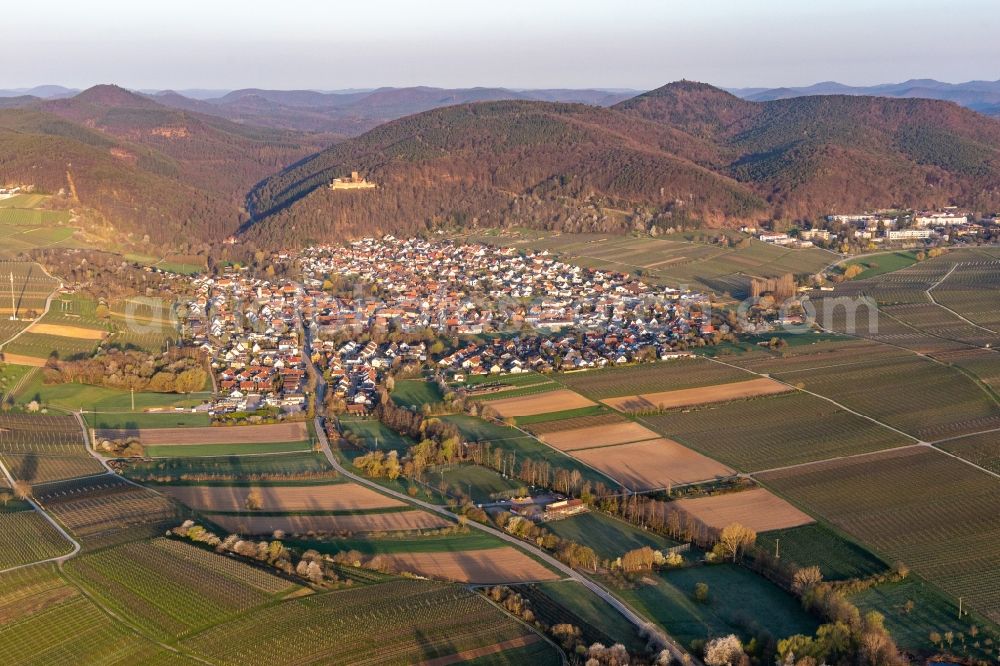 Klingenmünster from the bird's eye view: Klingbachtal in the spring bloom before mountain scenery at Haardtrand of Palatinat forest in Klingenmuenster in the state Rhineland-Palatinate