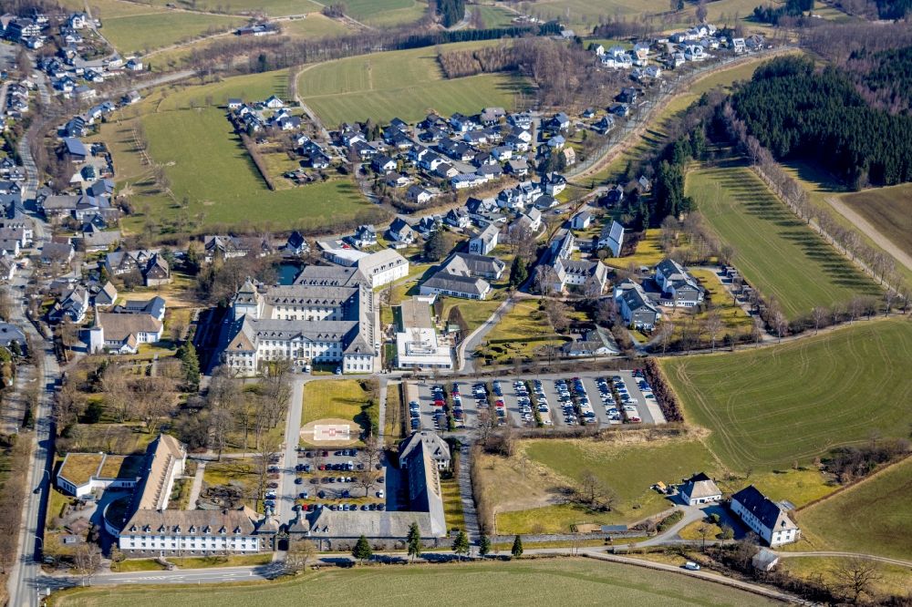Aerial photograph Grafschaft - Wintry snowy Clinic of the hospital grounds Fachkrankenhaus Kloster Grafschaft an der Annostrasse in Grafschaft on Sauerland in the state North Rhine-Westphalia