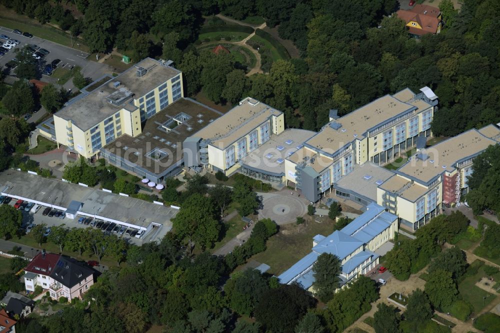 Aerial photograph Bad Düben - Hospital grounds of the rehabilitation center of the clinic MediClin Waldkrankenhaus in Bad Dueben in the state of Saxony. The building complex and compound is located on Kur Park in the centre of the town