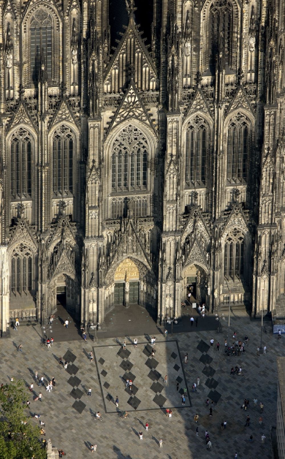 Köln from above - View of the Cologne Cathedral in the center of Cologne, near central station. The Cologne Cathedral is a Roman Catholic church in the Gothic style in Cologne and the Cathedral of the Archdiocese of Cologne. It is the second highest church building in Europe and the third highest in the world