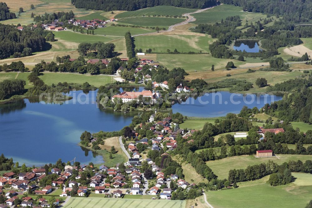 Aerial photograph Seeon-Seebruck - The former Benedictine monastery Seeon on a peninsula of the Klostersee in Seeon in the state of Bavaria serves today as a conference hotel, cultural and educational center
