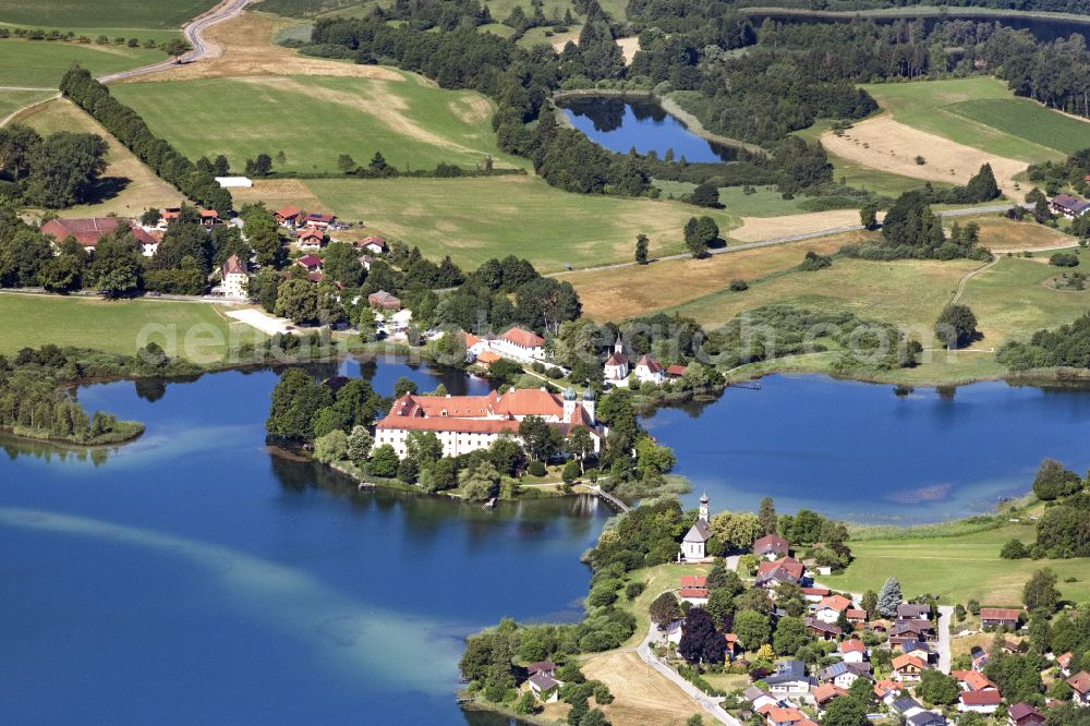 Seeon-Seebruck from above - The former Benedictine monastery Seeon on a peninsula of the Klostersee in Seeon in the state of Bavaria serves today as a conference hotel, cultural and educational center