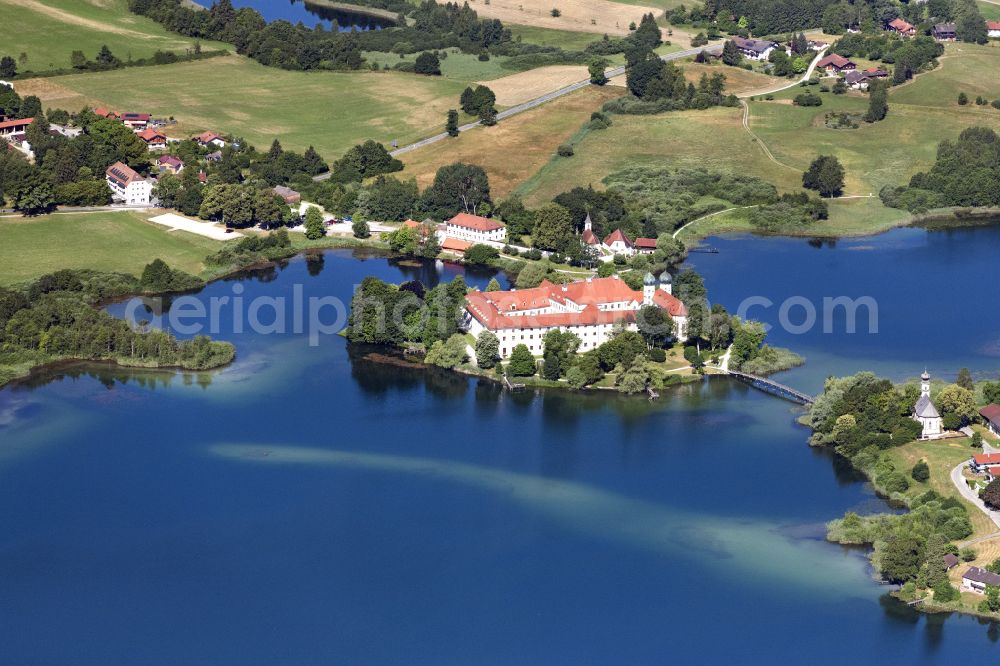 Seeon-Seebruck from the bird's eye view: The former Benedictine monastery Seeon on a peninsula of the Klostersee in Seeon in the state of Bavaria serves today as a conference hotel, cultural and educational center