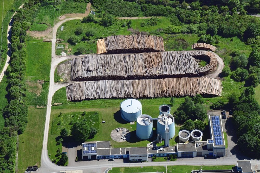Donaueschingen from above - Sewage works basin and purification steps for waste water treatment in Donaueschingen in the state Baden-Wuerttemberg, Germany together with a timber yard of spruce trunks
