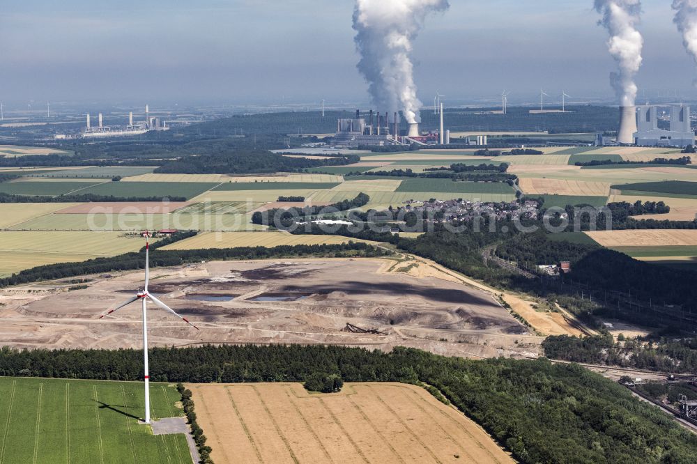 Niederaußem from the bird's eye view: Coal power plants of the RWE Power AG Kraftwerk Niederaussem in Bergheim in the state North Rhine-Westphalia, Germany