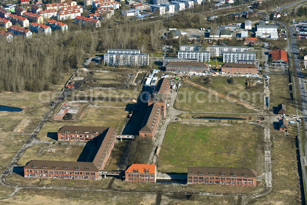 Bernau from above - Construction site for the renovation and reconstruction of the building complex of the former military barracks on Schwanbecker Chaussee in the district Lindow in Bernau in the state Brandenburg, Germany