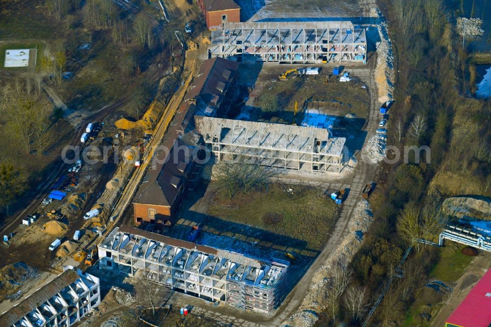 Bernau from above - Construction site for the renovation and reconstruction of the building complex of the former military barracks Sanierungsgebiet Panke-Park on Schoenfelder Weg in Bernau in the state Brandenburg, Germany