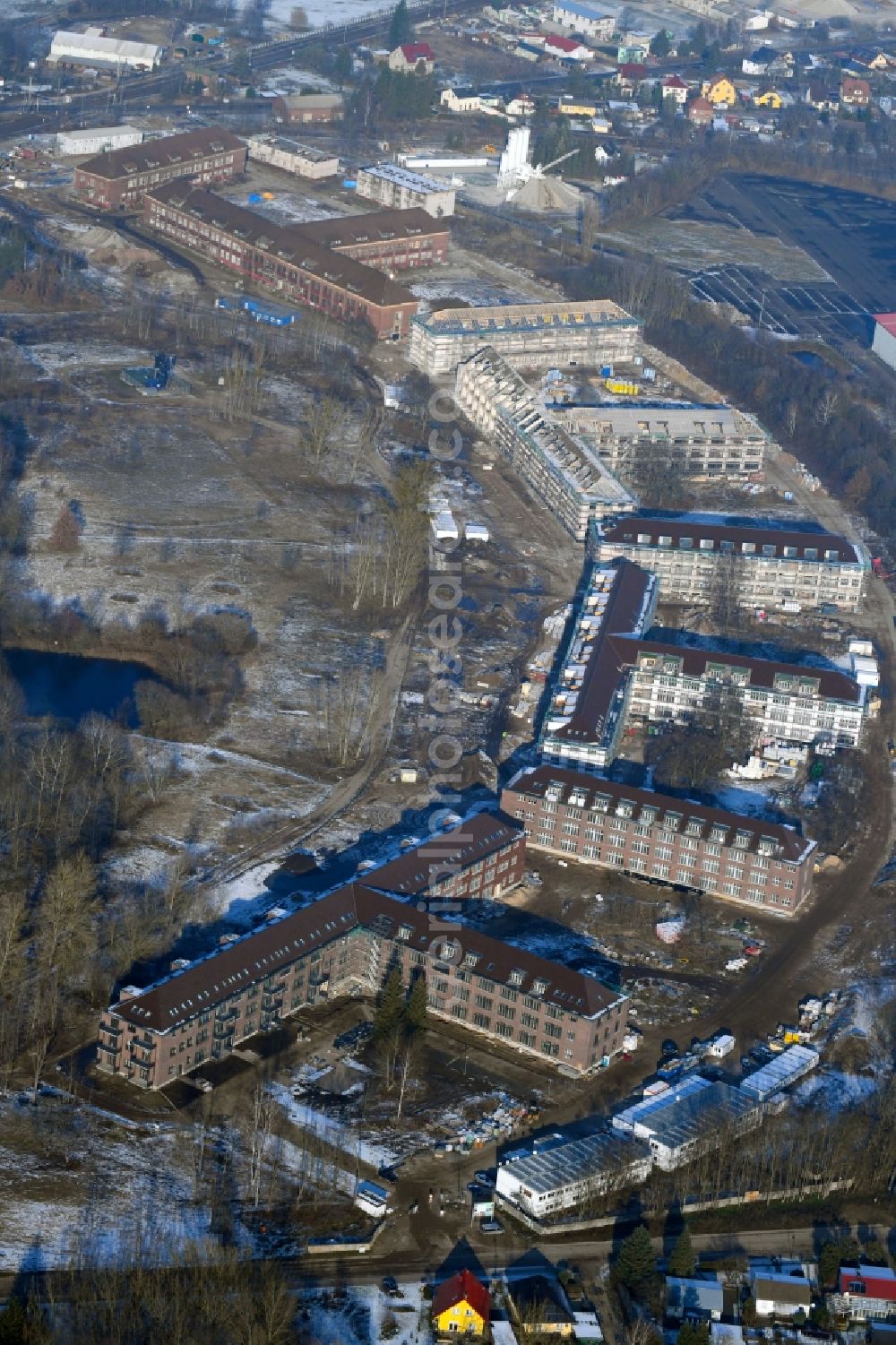 Aerial photograph Bernau - Construction site for the renovation and reconstruction of the building complex of the former military barracks Sanierungsgebiet Panke-Park on Schoenfelder Weg in Bernau in the state Brandenburg, Germany