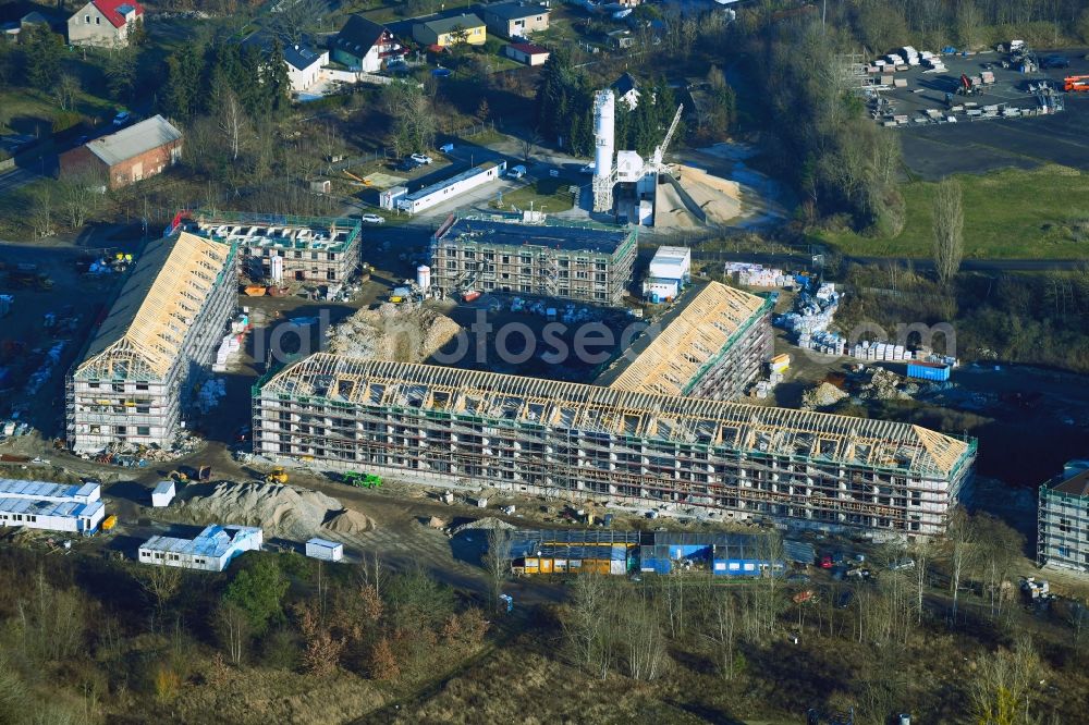 Aerial photograph Bernau - Construction site for the renovation and reconstruction of the building complex of the former military barracks Sanierungsgebiet Panke-Park on Schoenfelder Weg in Bernau in the state Brandenburg, Germany