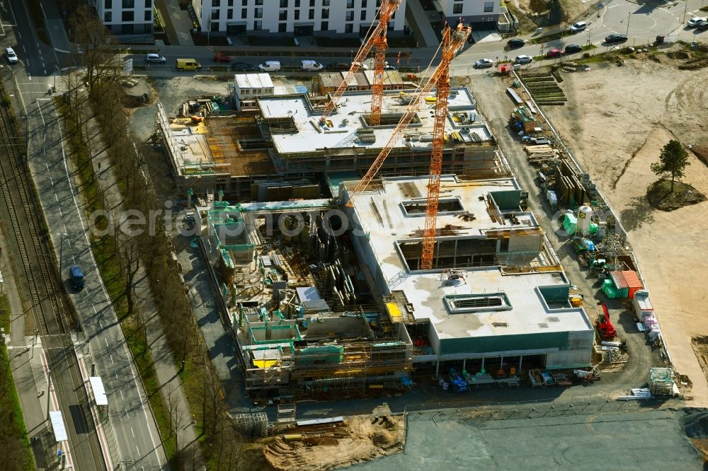 Darmstadt from the bird's eye view: Construction site for the reconstruction of the building complex of the personal military barracks Lincoln settlement - Neubauer elementary school and day care center and Einsteinstrasse in Darmstadt in the state Hesse, Germany
