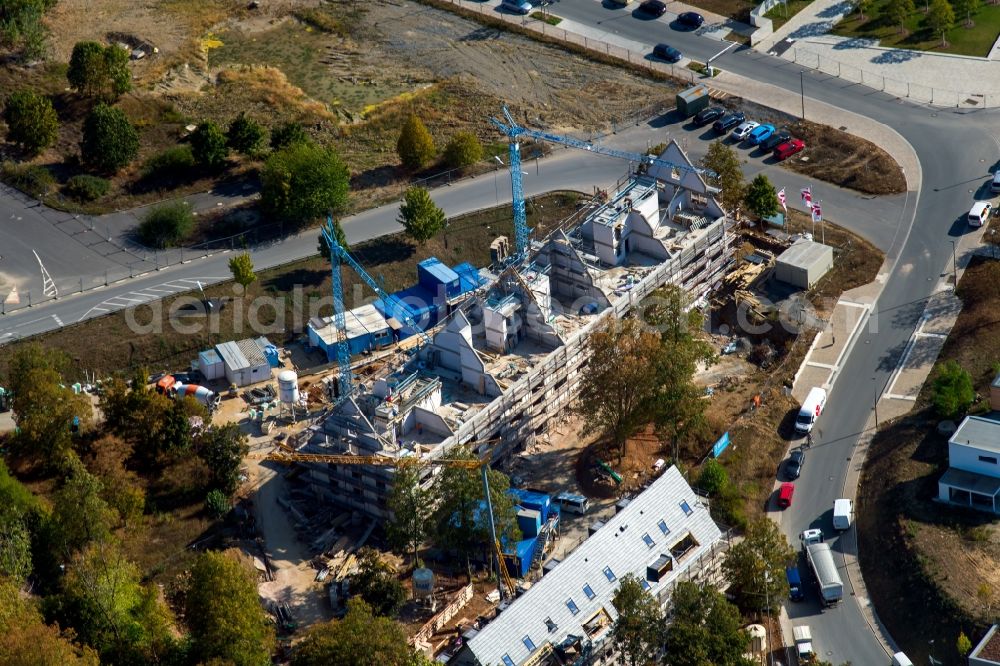 Würzburg from the bird's eye view: Construction site for the renovation and reconstruction of the building complex of the former military barracks on Elisabeth-Scheuring-Strasse in the district Hubland in Wuerzburg in the state Bavaria, Germany