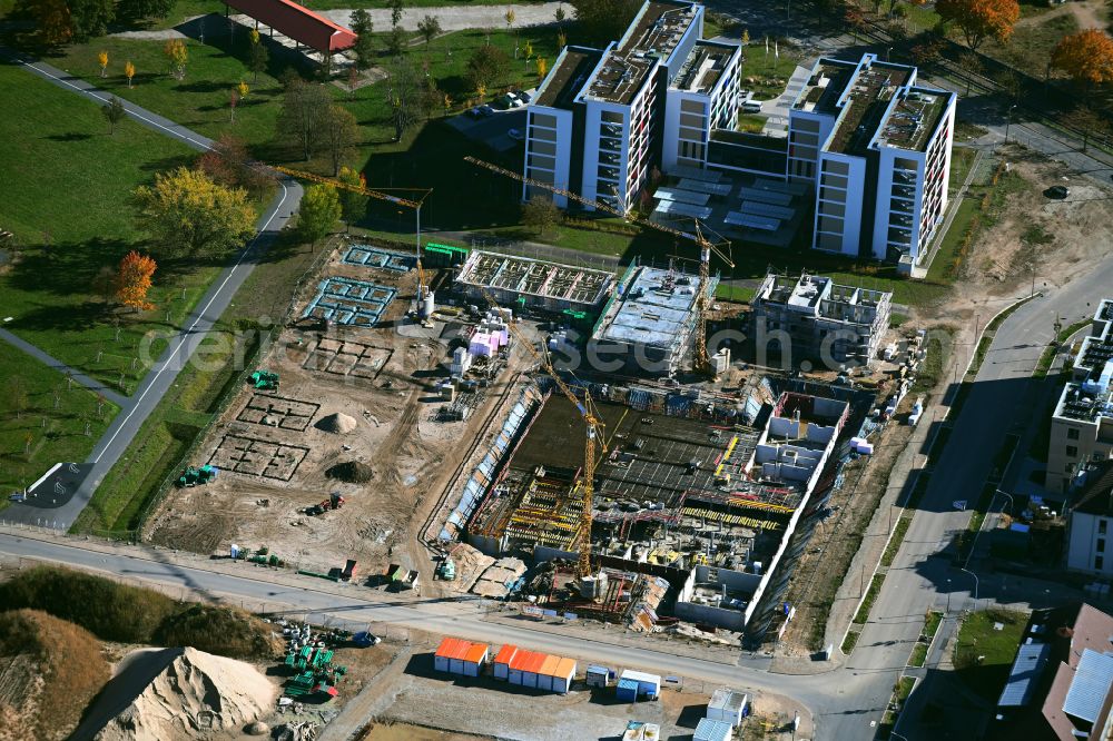 Aerial photograph Mannheim - Conversion construction site on the site of the former SULLIVAN US barracks - new construction of a housing estate on Robert-Funari-Strasse - George-Washington-Strasse in Mannheim in the state Baden-Wuerttemberg, Germany